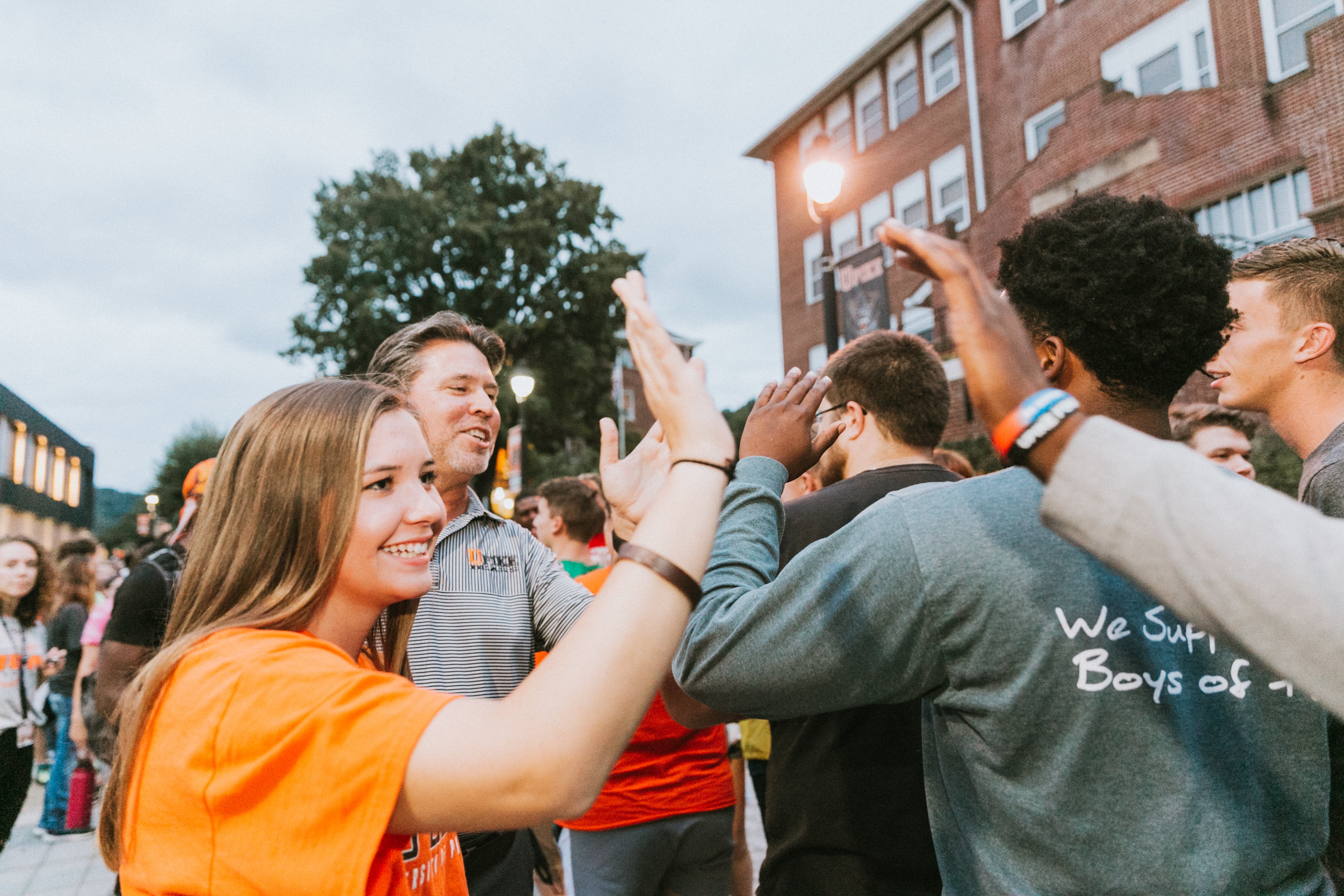 Dr. Webb high fives at the Climb at UPIKE